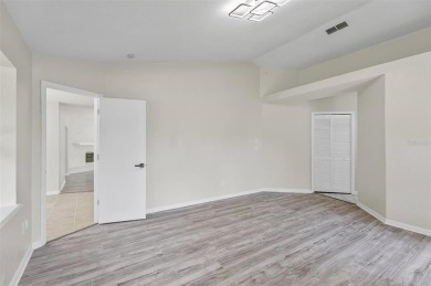 Light-Filled Designer Pool Home | New Roof | Gourmet Kitchen | on The Grand Club - Pine Lakes Course in Florida - for sale on GolfHomes.com, golf home, golf lot