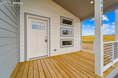 Experience modern country living with breathtaking mountain on Hollydot Golf Course in Colorado - for sale on GolfHomes.com, golf home, golf lot