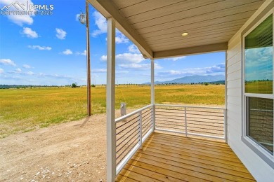 Experience modern country living with breathtaking mountain on Hollydot Golf Course in Colorado - for sale on GolfHomes.com, golf home, golf lot