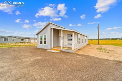 Experience modern country living with breathtaking mountain on Hollydot Golf Course in Colorado - for sale on GolfHomes.com, golf home, golf lot