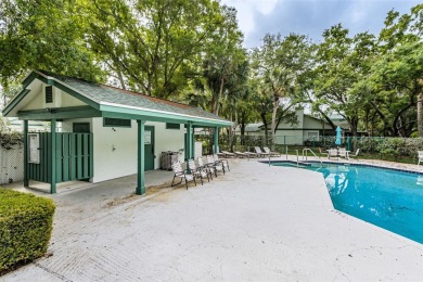 Under contract-accepting backup offers. Coveted Woodridge Green on East Lake Woodlands Country Club in Florida - for sale on GolfHomes.com, golf home, golf lot