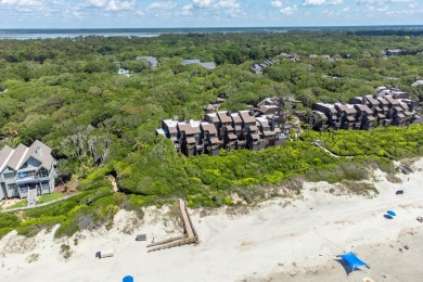 Step into refined coastal luxury at 4303 Windswept Villas, a on Kiawah Island Resort - Cougar Point in South Carolina - for sale on GolfHomes.com, golf home, golf lot