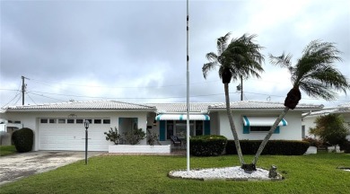 Beautiful home with a gorgeous water view! Well maintained on Mainlands Golf Club in Florida - for sale on GolfHomes.com, golf home, golf lot