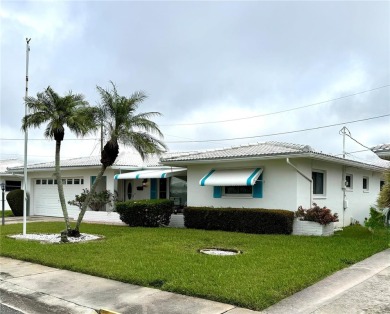 Beautiful home with a gorgeous water view! Well maintained on Mainlands Golf Club in Florida - for sale on GolfHomes.com, golf home, golf lot