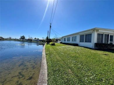 Beautiful home with a gorgeous water view! Well maintained on Mainlands Golf Club in Florida - for sale on GolfHomes.com, golf home, golf lot