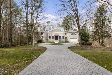 An extraordinary custom built estate w/ gorgeous swimming pool on TPC at Wakefield Plantation in North Carolina - for sale on GolfHomes.com, golf home, golf lot