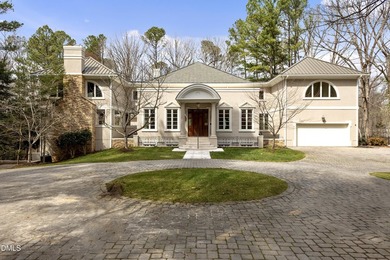 An extraordinary custom built estate w/ gorgeous swimming pool on TPC at Wakefield Plantation in North Carolina - for sale on GolfHomes.com, golf home, golf lot