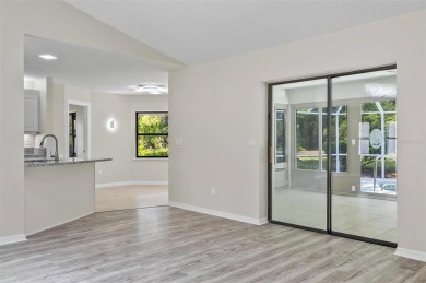 Light-Filled Designer Pool Home | New Roof | Gourmet Kitchen | on The Grand Club - Pine Lakes Course in Florida - for sale on GolfHomes.com, golf home, golf lot