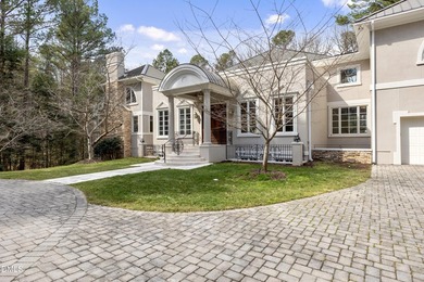 An extraordinary custom built estate w/ gorgeous swimming pool on TPC at Wakefield Plantation in North Carolina - for sale on GolfHomes.com, golf home, golf lot