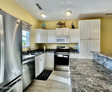 Welcome to your own piece of coastal paradise in the desirable on South Harbour Golf Links in North Carolina - for sale on GolfHomes.com, golf home, golf lot