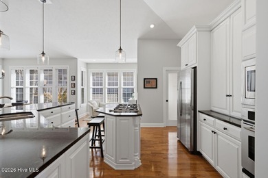 Step into this beautifully designed 3-bedroom, 2-bath home in on Ocean Ridge Plantation in North Carolina - for sale on GolfHomes.com, golf home, golf lot