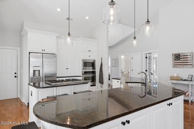 Step into this beautifully designed 3-bedroom, 2-bath home in on Ocean Ridge Plantation in North Carolina - for sale on GolfHomes.com, golf home, golf lot