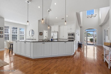 Step into this beautifully designed 3-bedroom, 2-bath home in on Ocean Ridge Plantation in North Carolina - for sale on GolfHomes.com, golf home, golf lot