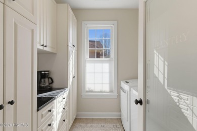 Step into this beautifully designed 3-bedroom, 2-bath home in on Ocean Ridge Plantation in North Carolina - for sale on GolfHomes.com, golf home, golf lot