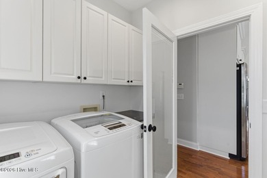 Step into this beautifully designed 3-bedroom, 2-bath home in on Ocean Ridge Plantation in North Carolina - for sale on GolfHomes.com, golf home, golf lot