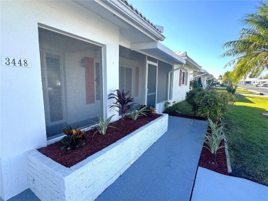 Nestled in the heart of The Mainlands, this stunning dream home on Mainlands Golf Club in Florida - for sale on GolfHomes.com, golf home, golf lot