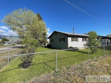 Corner lot in town with ranch style home. Over the last few on Salmon Valley Golf Course in Idaho - for sale on GolfHomes.com, golf home, golf lot