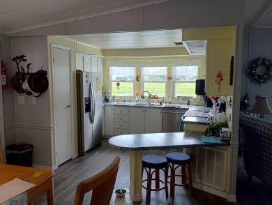 Come see this fully furnished home with stunning views of the on Lake Fairways Country Club in Florida - for sale on GolfHomes.com, golf home, golf lot