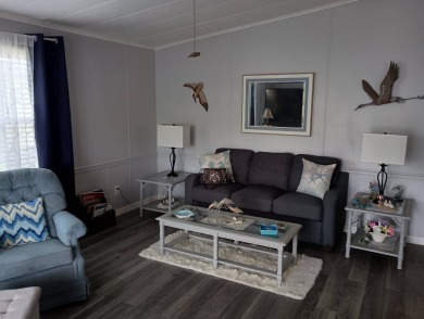 Come see this fully furnished home with stunning views of the on Lake Fairways Country Club in Florida - for sale on GolfHomes.com, golf home, golf lot