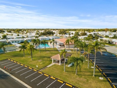 Nestled in the heart of The Mainlands, this stunning dream home on Mainlands Golf Club in Florida - for sale on GolfHomes.com, golf home, golf lot