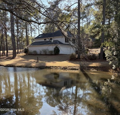 Experience modern living in this contemporary split-level home on Deercroft Golf and Country Club in North Carolina - for sale on GolfHomes.com, golf home, golf lot