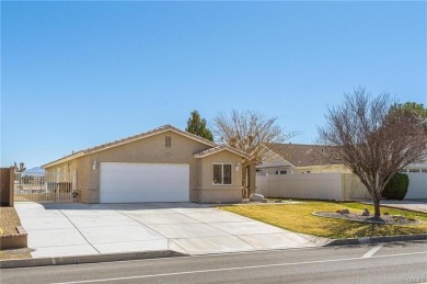 Discover this stunning 3-bedroom, 2-bathroom single-story home on Spring Valley Lake Country Club in California - for sale on GolfHomes.com, golf home, golf lot