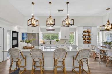 This beautifully renovated corner unit Villa has it all! on The Golf Club of Jupiter in Florida - for sale on GolfHomes.com, golf home, golf lot