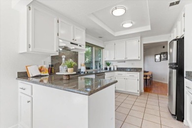 Welcome to this rare single-level end unit, perfectly positioned on Villages Golf and Country Club in California - for sale on GolfHomes.com, golf home, golf lot