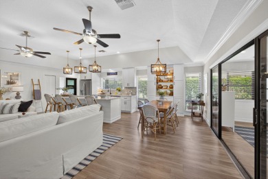 This beautifully renovated corner unit Villa has it all! on The Golf Club of Jupiter in Florida - for sale on GolfHomes.com, golf home, golf lot