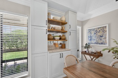 This beautifully renovated corner unit Villa has it all! on The Golf Club of Jupiter in Florida - for sale on GolfHomes.com, golf home, golf lot