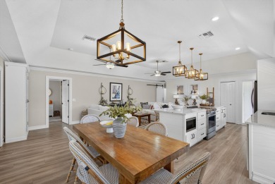 This beautifully renovated corner unit Villa has it all! on The Golf Club of Jupiter in Florida - for sale on GolfHomes.com, golf home, golf lot