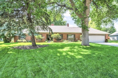 Welcome to 1305 18th Ave W--a beautifully maintained brick ranch on Spencer Golf and Country Club in Iowa - for sale on GolfHomes.com, golf home, golf lot