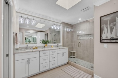 This beautifully renovated corner unit Villa has it all! on The Golf Club of Jupiter in Florida - for sale on GolfHomes.com, golf home, golf lot