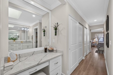 This beautifully renovated corner unit Villa has it all! on The Golf Club of Jupiter in Florida - for sale on GolfHomes.com, golf home, golf lot