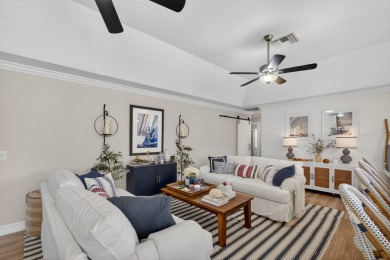 This beautifully renovated corner unit Villa has it all! on The Golf Club of Jupiter in Florida - for sale on GolfHomes.com, golf home, golf lot