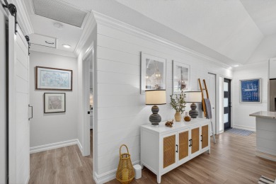 This beautifully renovated corner unit Villa has it all! on The Golf Club of Jupiter in Florida - for sale on GolfHomes.com, golf home, golf lot