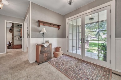 Welcome to 1305 18th Ave W--a beautifully maintained brick ranch on Spencer Golf and Country Club in Iowa - for sale on GolfHomes.com, golf home, golf lot