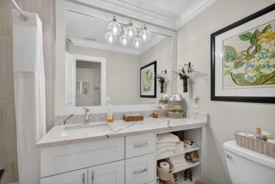 This beautifully renovated corner unit Villa has it all! on The Golf Club of Jupiter in Florida - for sale on GolfHomes.com, golf home, golf lot