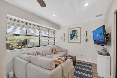 This beautifully renovated corner unit Villa has it all! on The Golf Club of Jupiter in Florida - for sale on GolfHomes.com, golf home, golf lot