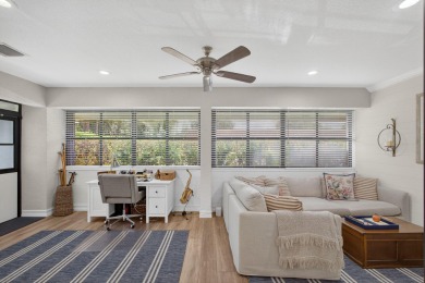 This beautifully renovated corner unit Villa has it all! on The Golf Club of Jupiter in Florida - for sale on GolfHomes.com, golf home, golf lot