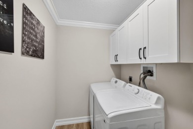 This beautifully renovated corner unit Villa has it all! on The Golf Club of Jupiter in Florida - for sale on GolfHomes.com, golf home, golf lot