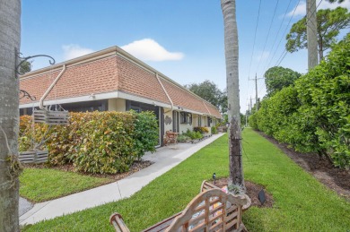 This beautifully renovated corner unit Villa has it all! on The Golf Club of Jupiter in Florida - for sale on GolfHomes.com, golf home, golf lot