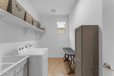 Welcome to Estrella Mountain Ranch living in this inviting on Estrella Mountain Ranch Golf Course in Arizona - for sale on GolfHomes.com, golf home, golf lot