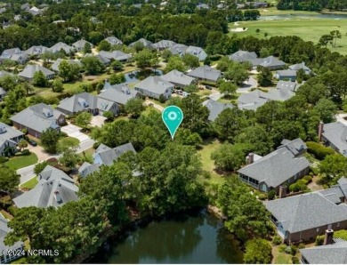 This luxurious residence in Wilmington's prestigious Landfall on Country Club of Landfall in North Carolina - for sale on GolfHomes.com, golf home, golf lot