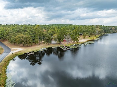 Nestled in a serene, wooded interior lot, this beautifully on Holly Lake Ranch Golf Club in Texas - for sale on GolfHomes.com, golf home, golf lot