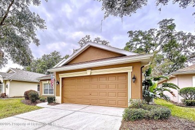 A brand new roof will top this beautiful home before closing! on Hernando Oaks Golf and Country Club in Florida - for sale on GolfHomes.com, golf home, golf lot