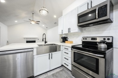 Nestled in a serene, wooded interior lot, this beautifully on Holly Lake Ranch Golf Club in Texas - for sale on GolfHomes.com, golf home, golf lot