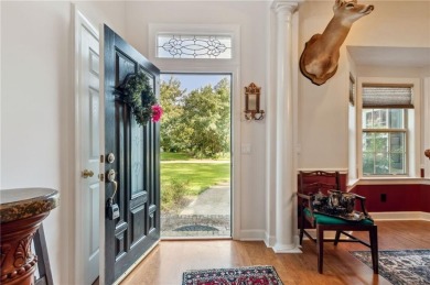 Discover your dream home nestled alongside the stunning 8th hole on The Club At Osprey Cove in Georgia - for sale on GolfHomes.com, golf home, golf lot