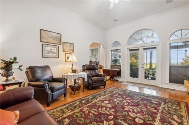 Discover your dream home nestled alongside the stunning 8th hole on The Club At Osprey Cove in Georgia - for sale on GolfHomes.com, golf home, golf lot