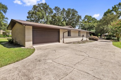 Lovely Golf Course Home with NO HOA FEES. You'll find Character on Rocky Bayou Country Club in Florida - for sale on GolfHomes.com, golf home, golf lot